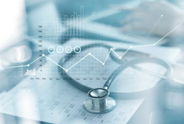 A conceptual image that illustrates the financial health of your business showing financial information along with health objects including a stethoscope