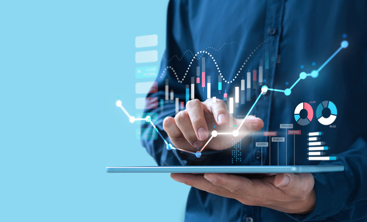 A conceptual image showing a business person holding a tablet to study their company's management accounts.